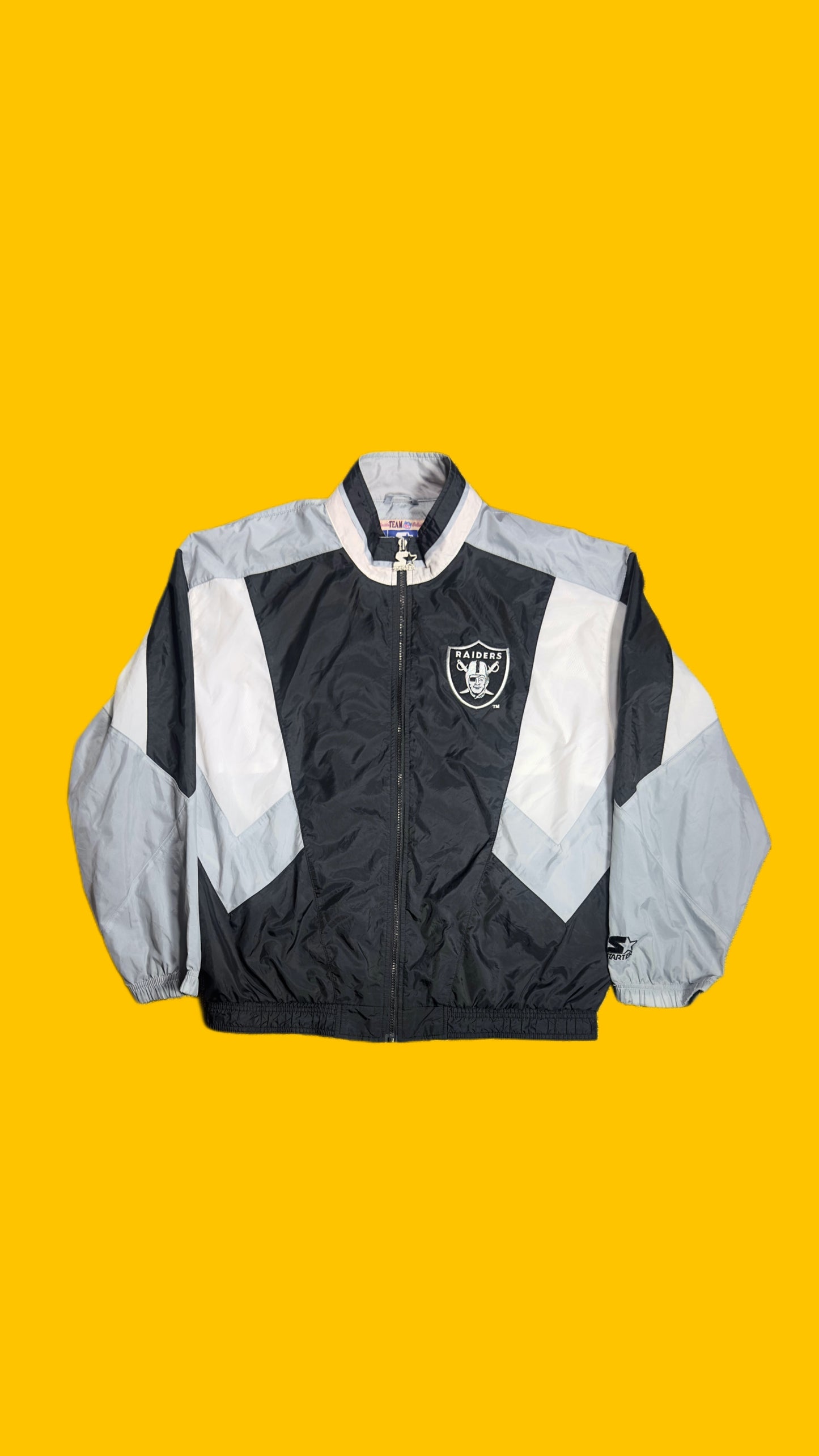 Oakland Raiders Starter Windbreaker